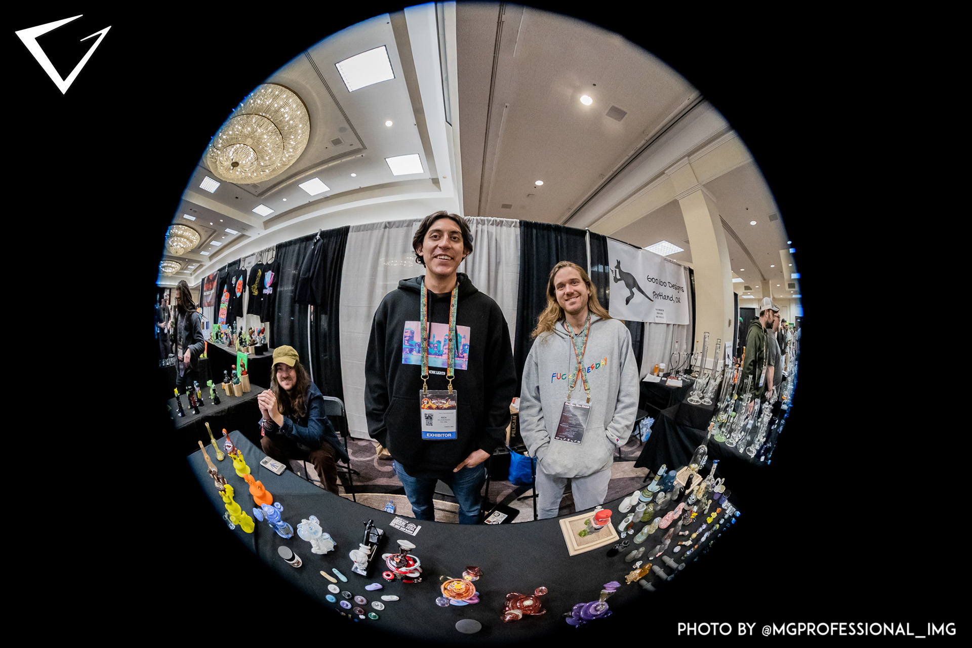 Artists at booth on Show Floor Posing