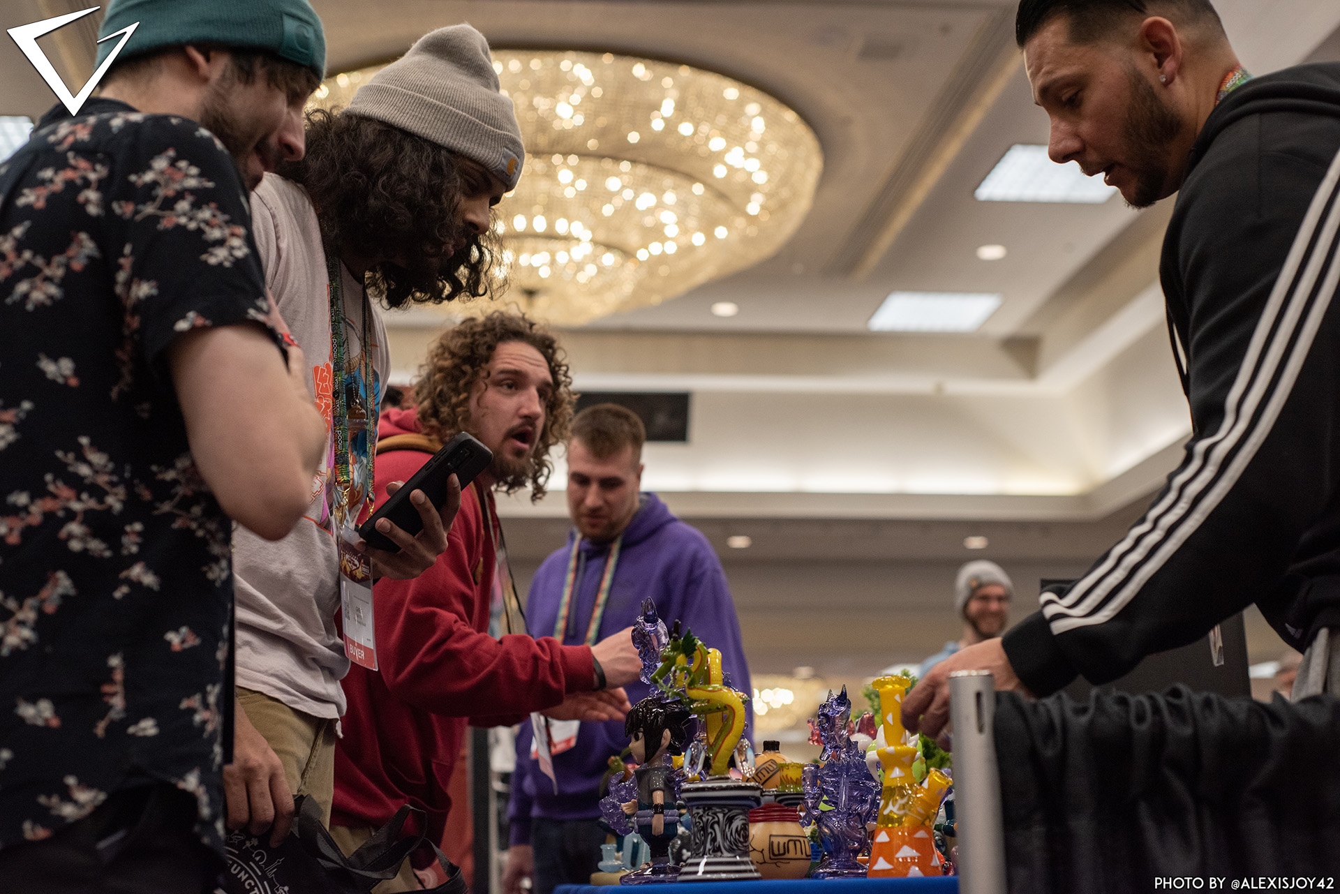 People checking out Exhibitor Booth