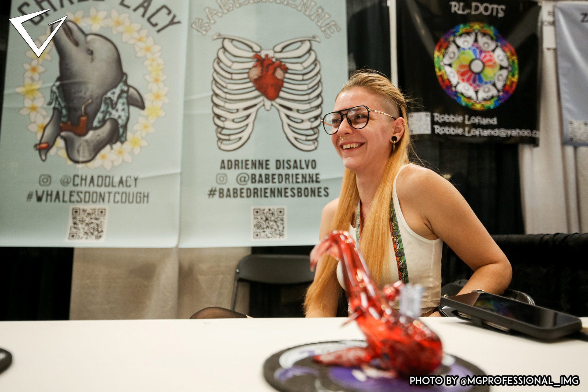 Glass Artist Smiling at Booth