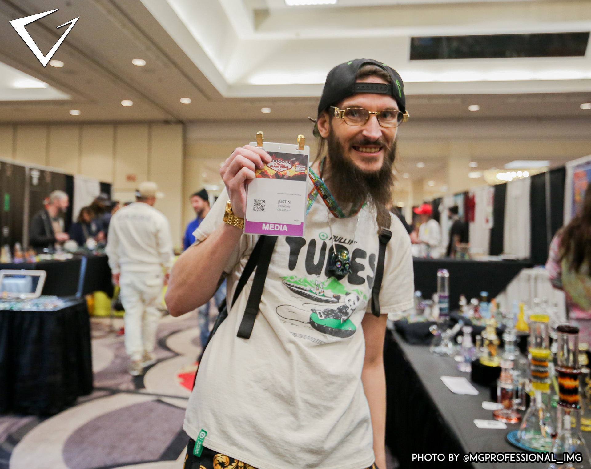 Media Person Holding Badge